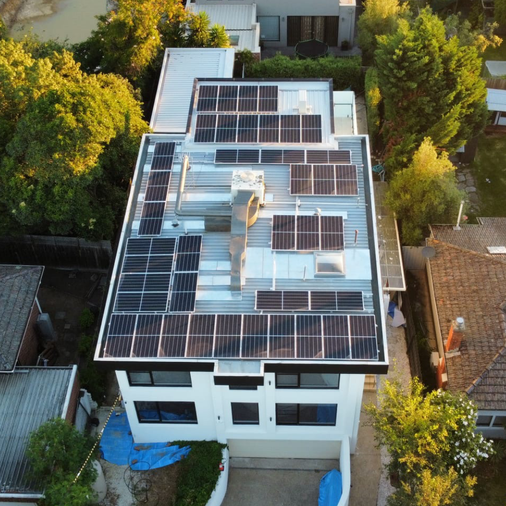 Aerial View of Solar Panels Installed on Residential Home Roof in Melbourne